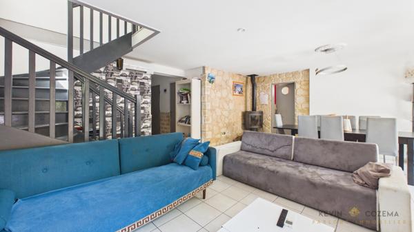 Maison familiale de 100 m² avec double garage, jardin