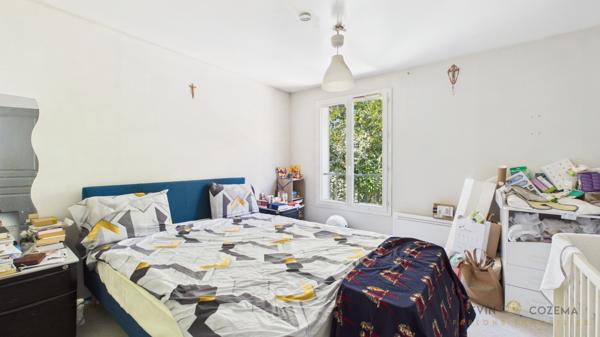 Maison familiale de 100 m² avec double garage, jardin