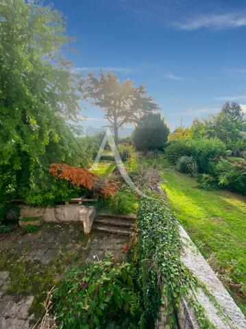 Maison de ville et son parc de 1241 m2