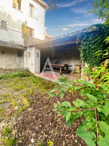 Maison de ville et son parc de 1241 m2