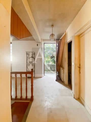 Maison de ville et son parc de 1241 m2