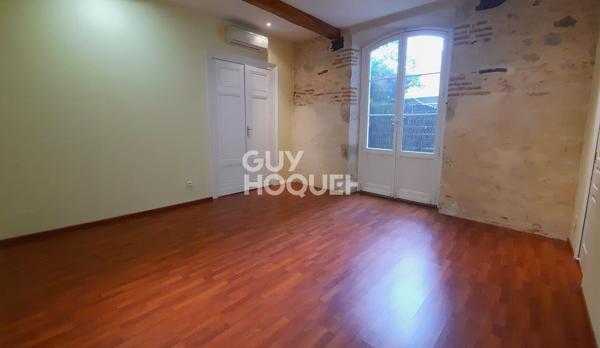 Appartement de caractère en centre-ville, avec terrasse