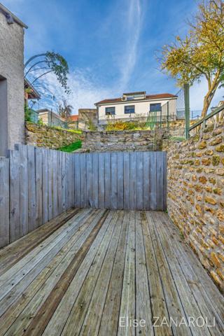 Maison de ville avec 4 chambres, garage et jardin à Volmerange!