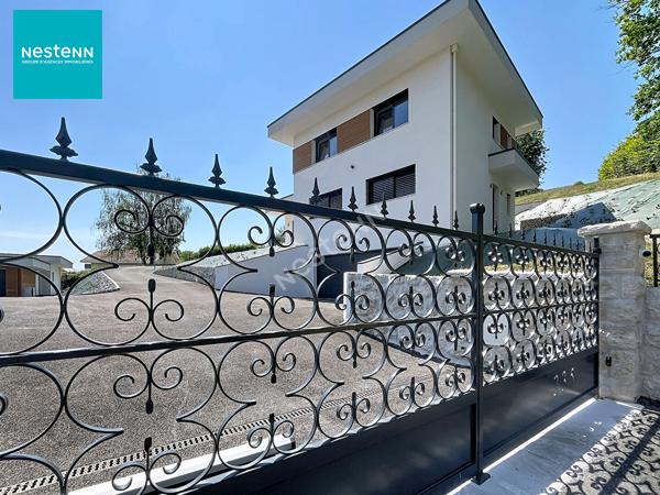 A vendre sur EPAGNY une maison moderne de 5 pièces de 182 m², avec jardin et garage double