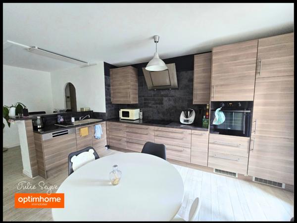 T3 Cessy centre en rez-de-jardin avec terrasse de 57 m², garage, cave et parking