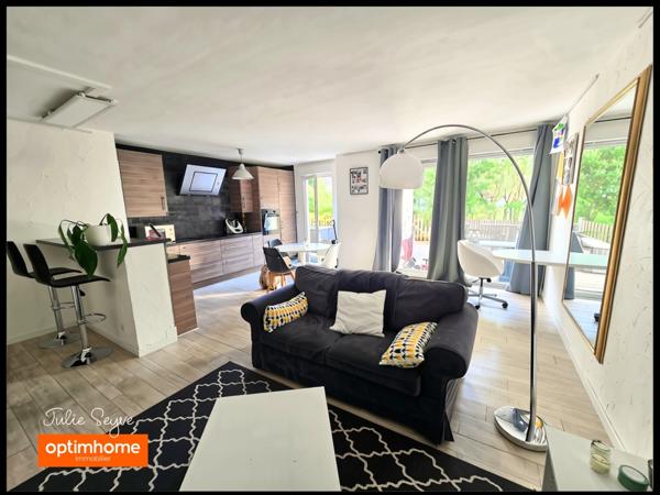 T3 Cessy centre en rez-de-jardin avec terrasse de 57 m², garage, cave et parking