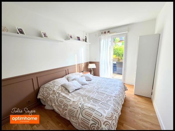 T3 Cessy centre en rez-de-jardin avec terrasse de 57 m², garage, cave et parking