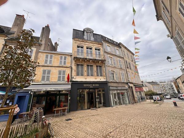 IMMEUBLE AVEC LOCAL COMMERCIAL - 3 PLATEAUX - NEVERS CENTRE-VILLE
