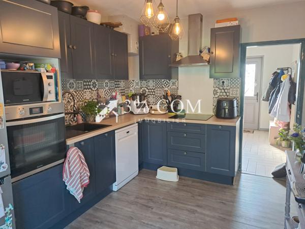 Maison 7 pièce(s) 3 chambre(s) 103 m²