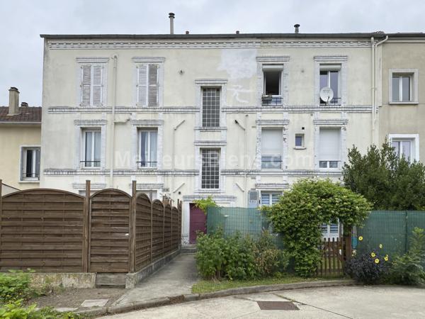 Duplex 69 m2 au sol avec cave et place parking