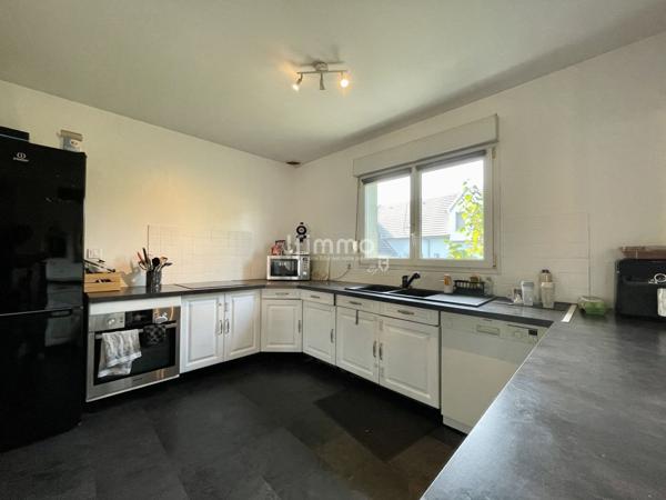 Maison mitoyenne récente avec Jardin