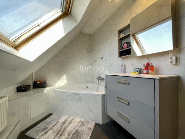 Maison mitoyenne récente avec Jardin