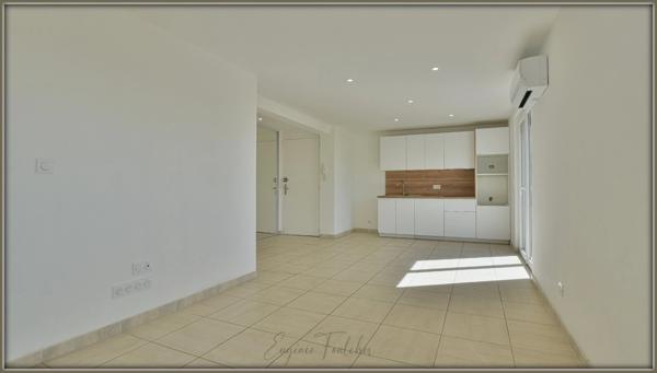 Appartement T4 rénové, clim, balcon, vue, garage et cave