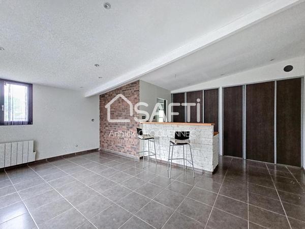 Maison d'habitation avec un studio indépendant