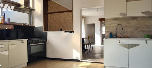 Maison à usage d'habitation d'une superficie d'environ 130 m² sur un terrain d'environ 622 m²