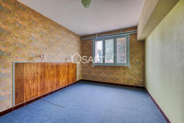 Maison familiale avec grand jardin arboré