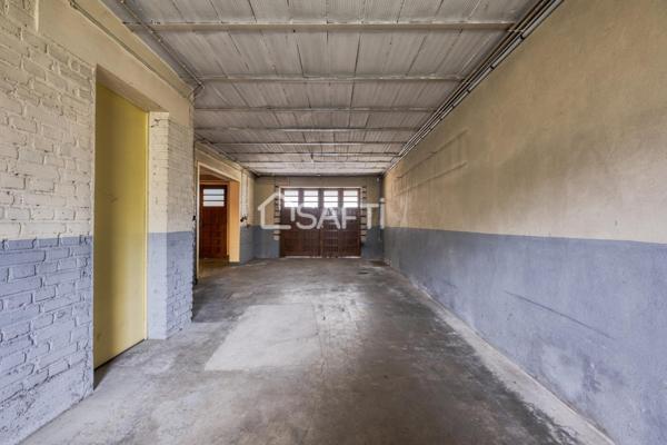 Maison familiale avec grand jardin arboré