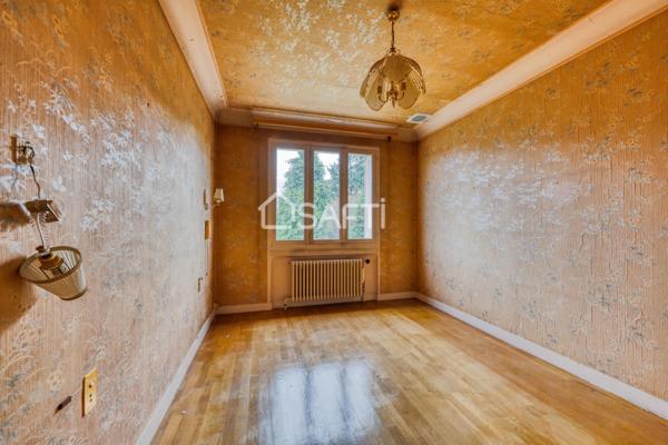 Maison familiale avec grand jardin arboré