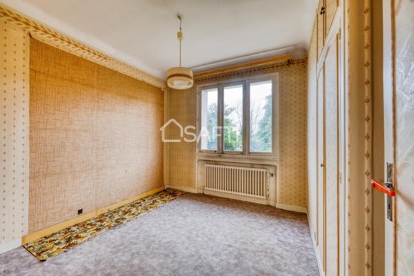 Maison familiale avec grand jardin arboré