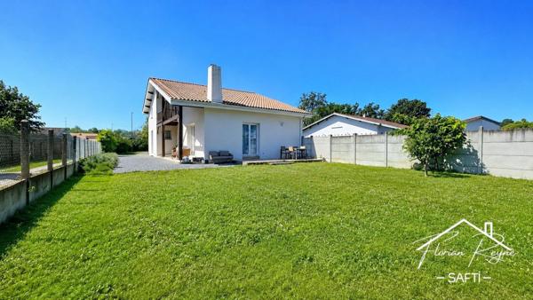 Maison familiale 158 m² – 4 chambres, jardin, garage et cave – Parempuyre