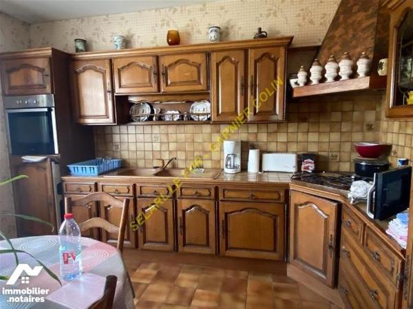 Ensemble maison, appartement et local commerce
