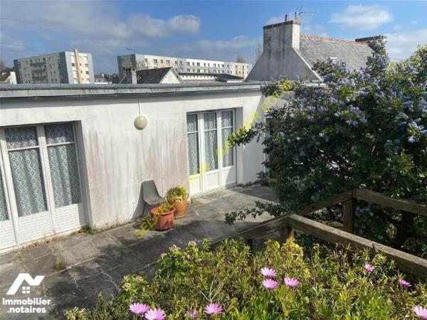 Ensemble maison, appartement et local commerce