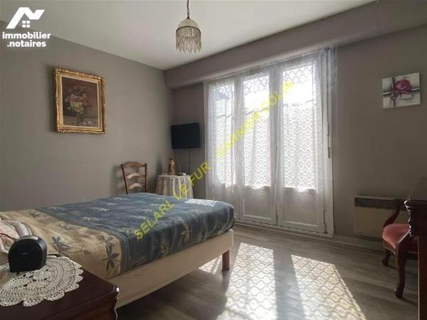 Ensemble maison, appartement et local commerce