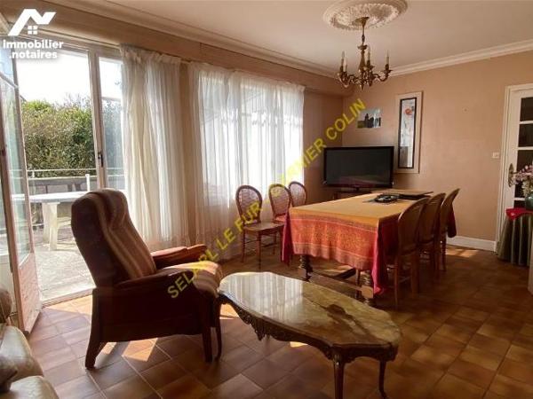 Ensemble maison, appartement et local commerce