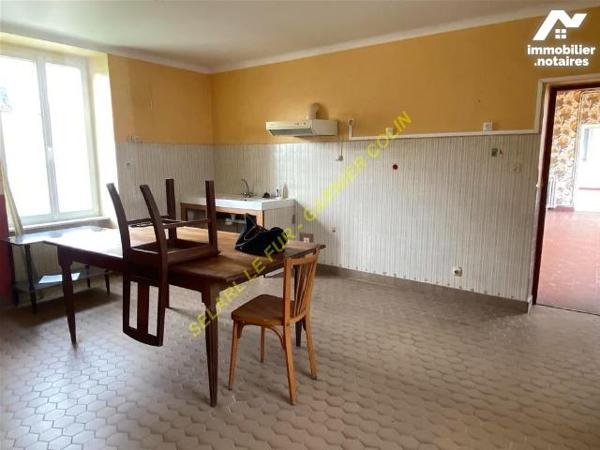 Ensemble maison, appartement et local commerce