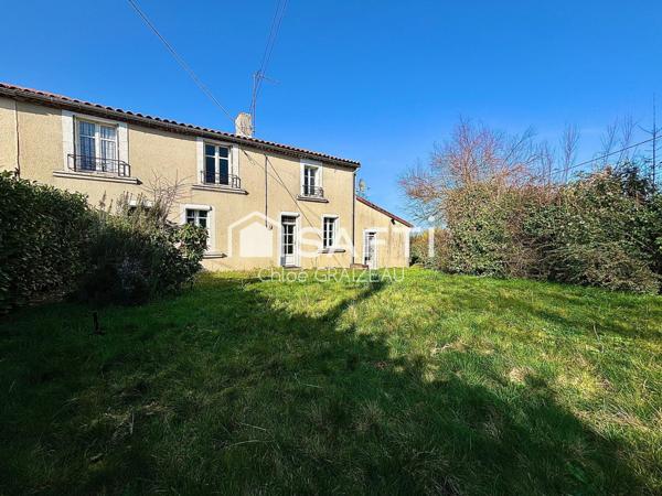 Maison de 160 m², 4 chambres, garage et atelier