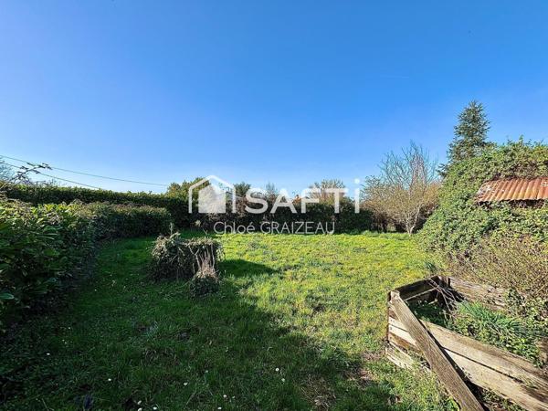 Maison de 160 m², 4 chambres, garage et atelier