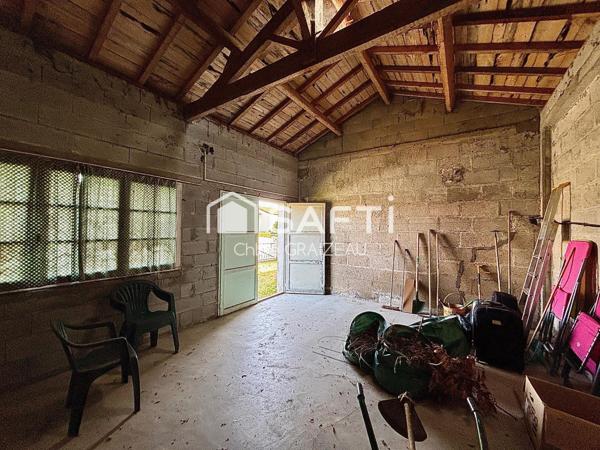 Maison de 160 m², 4 chambres, garage et atelier