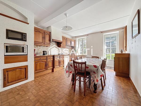 Maison de 160 m², 4 chambres, garage et atelier