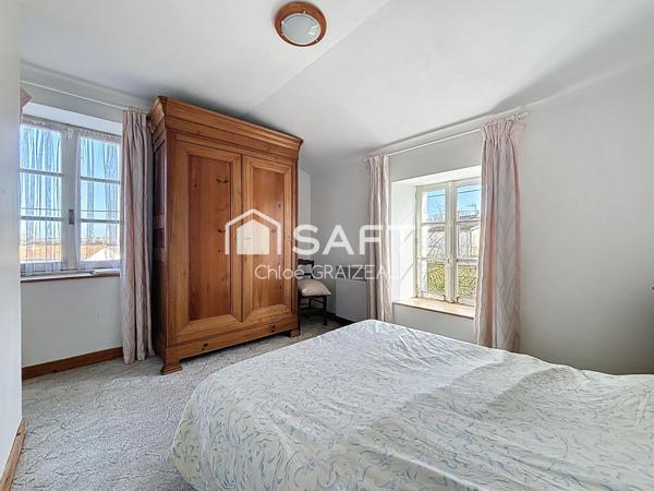 Maison de 160 m², 4 chambres, garage et atelier