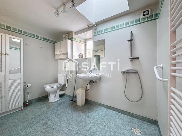 Maison de 160 m², 4 chambres, garage et atelier