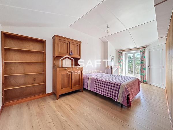 Maison de 160 m², 4 chambres, garage et atelier