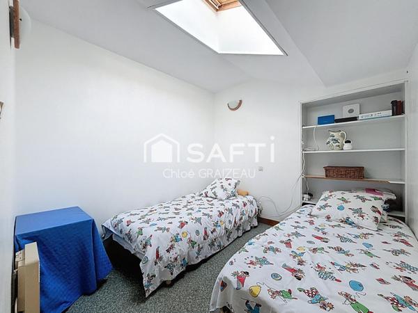 Maison de 160 m², 4 chambres, garage et atelier