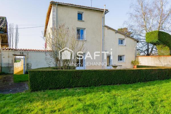 Maison 160 m² au calme avec beau terrain.