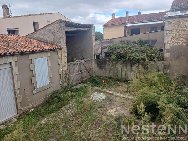 Immeuble à réhabiliter à vendre en plein centre de Saujon sur 260 m² de plancher.