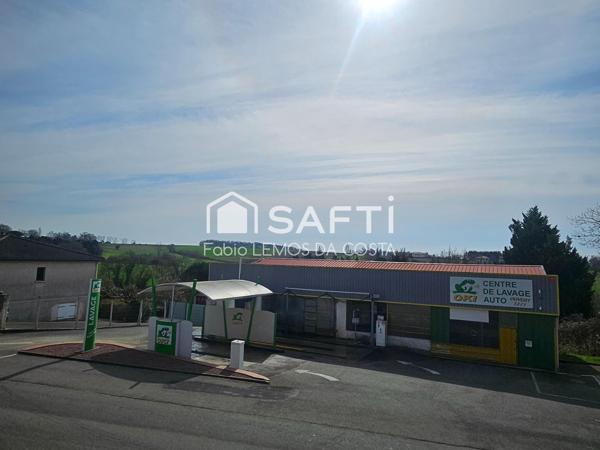 MUR/FOND DE COMMERCERCE STATION SERVICE ET MAISON