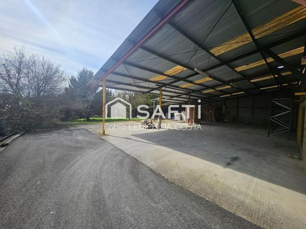 MUR/FOND DE COMMERCERCE STATION SERVICE ET MAISON