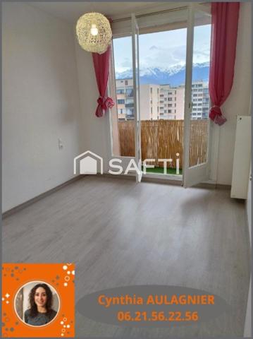 Appartement T3 avec balcon, cave et place de parking