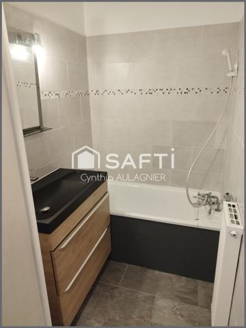 Appartement T3 avec balcon, cave et place de parking