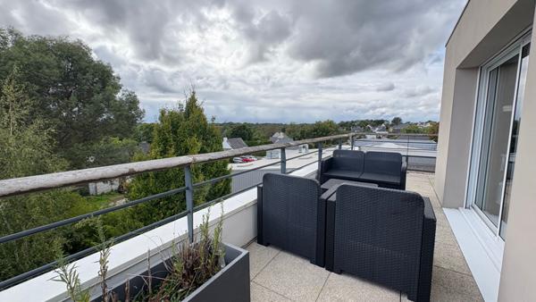 Appartement T3 à Auray avec grand garage, parking et terrasse