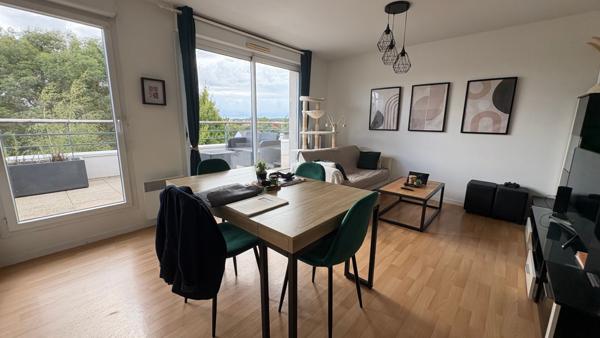 Appartement T3 à Auray avec grand garage, parking et terrasse