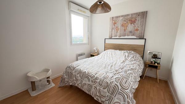 Appartement T3 à Auray avec grand garage, parking et terrasse