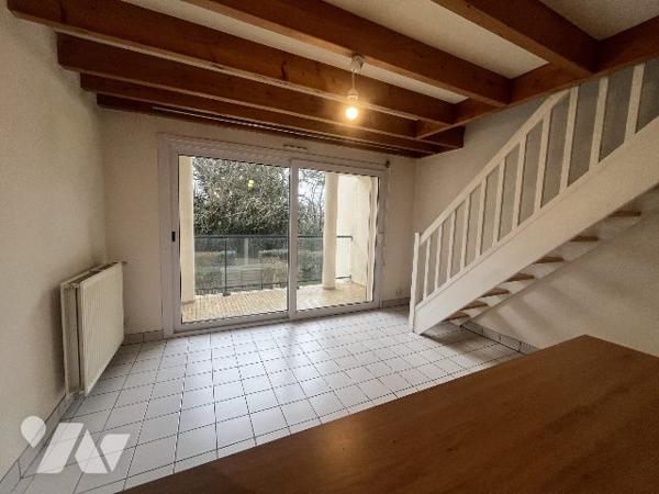 Appartement style duplex au 1er étage