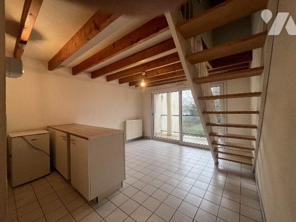 Appartement style duplex au 1er étage