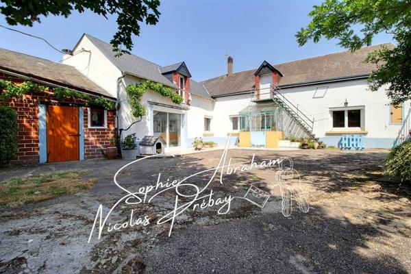 Fermette avec dépendances et terrain constructible