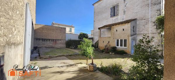 Bel appartement avec beaux volumes et grand jardin